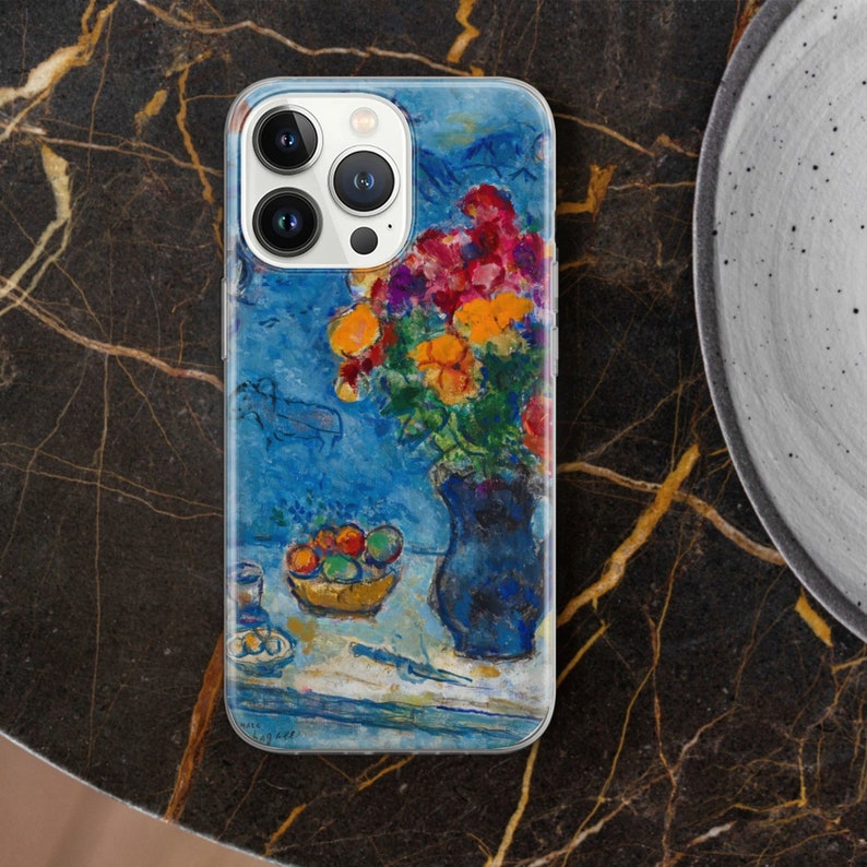 May include: A clear phone case with a colorful painting of a vase of flowers and a bowl of fruit. The painting is in a style reminiscent of Henri Matisse.