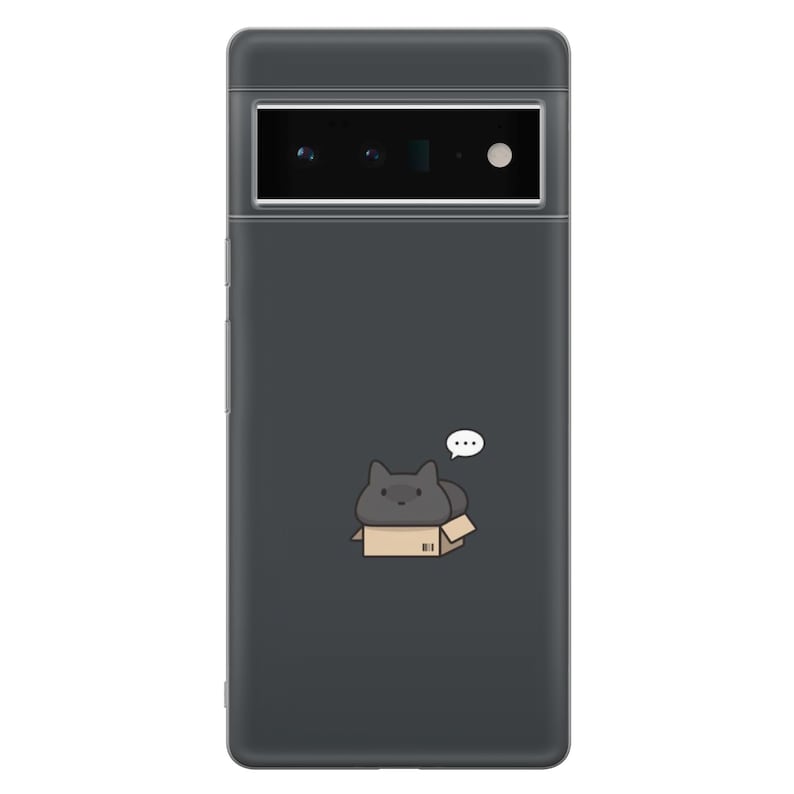 May include: A black phone case with a cartoon illustration of a black cat sitting in a cardboard box. The cat is looking to the right and has a thought bubble above its head.
