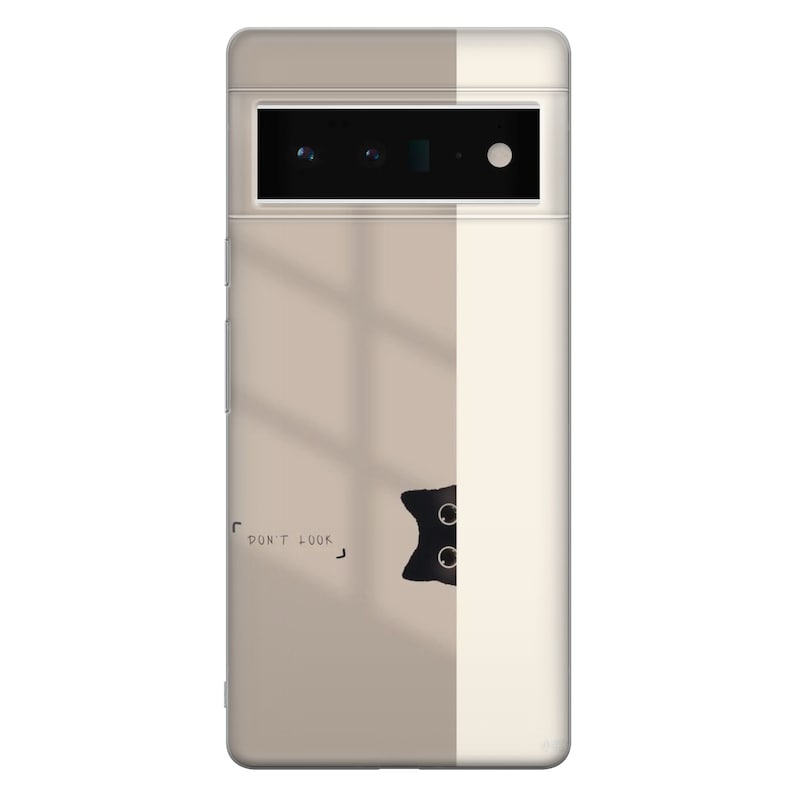 May include: A white and beige phone case with a black cat peeking out from behind a white stripe. The cat has two black eyes and a black nose. The text "DON'T LOOK" is printed on the case.