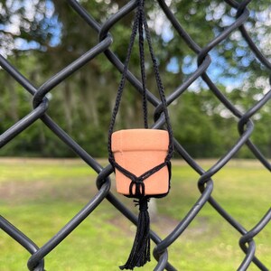 4 strand plat braid allows cord to sit flat and creates a sleek, minimalistic macrame.