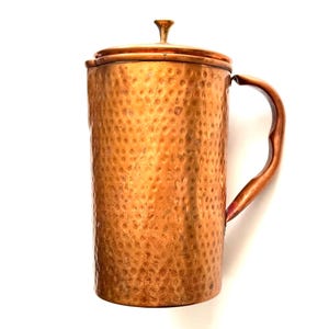 Vintage hammered copper jug pitcher