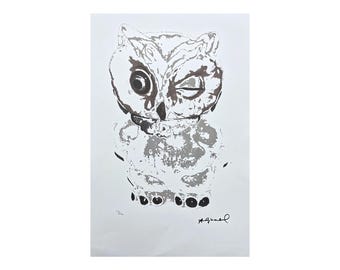 May include: A black and white print of an owl with a winking eye. The owl is depicted in a stylized, abstract manner. The print is signed by the artist, "A.Gunkel."