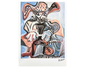 May include: A colorful abstract painting of a person wearing a hat. The painting is done in shades of blue, pink, and brown. The person's face is obscured by the hat, but their hands are visible. The painting is signed "Picasso" in the bottom right corner.