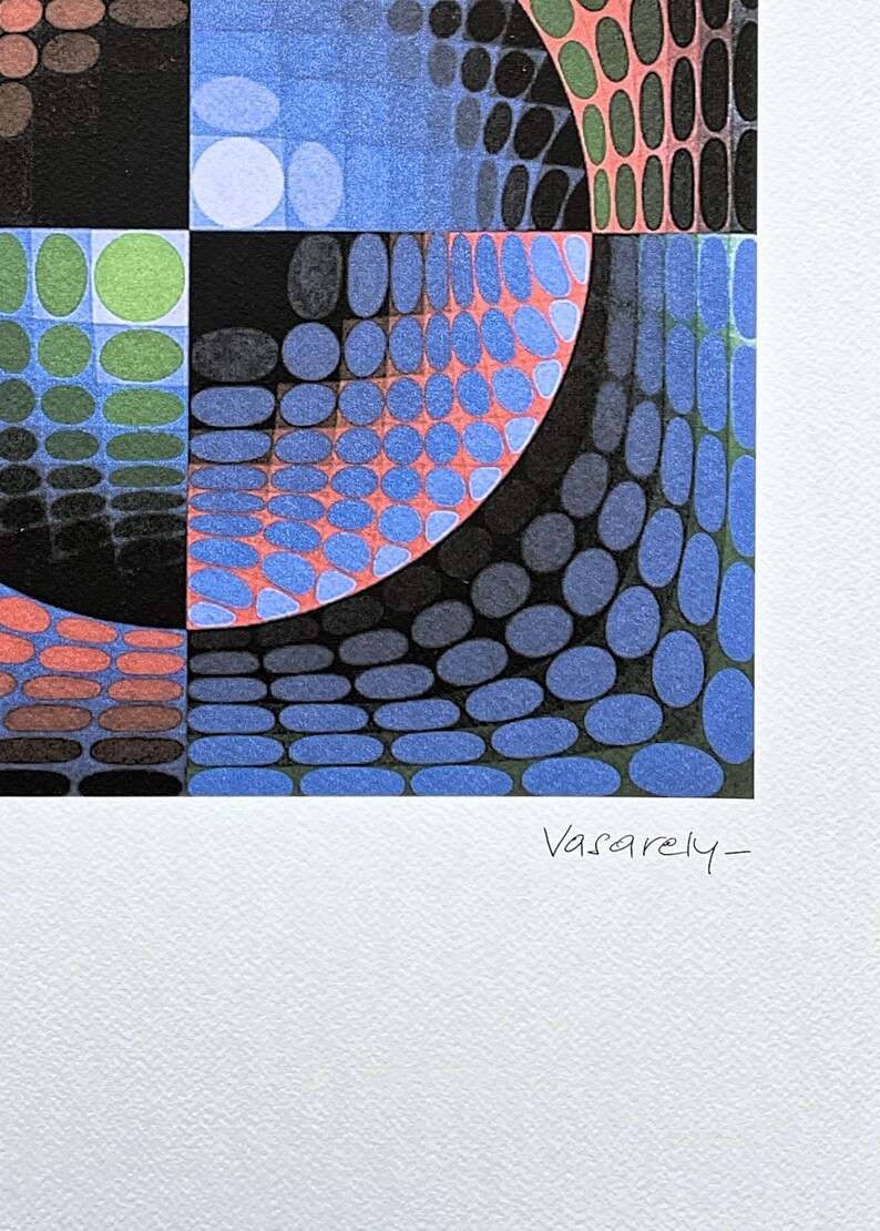 May include: Abstract geometric artwork featuring a colorful pattern of shapes and forms. The design incorporates blue, orange, green, and black elements, with a signature that reads "Vasarely-" in the bottom right corner. The artwork is on a white background.