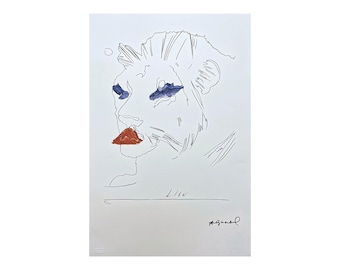 May include: A black and white line drawing of a lion's head with blue eyeshadow and red lipstick. The drawing is signed "Andy Warhol" and numbered "216/250".