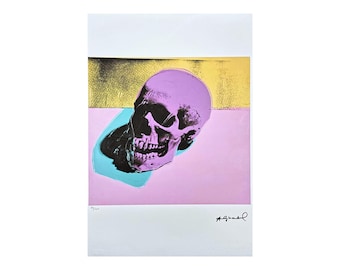 May include: A pink and purple skull with black eye sockets and teeth, printed on a white background with a yellow and blue background behind the skull.