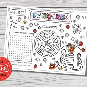 May include: A printable activity sheet with the word "PANCAKES" in colourful letters. The sheet includes a word search, a maze, tic-tac-toe, and a stack of pancakes with strawberries. A "FREE PRINTABLE" sticker is in the corner.