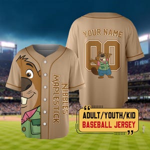 May include: Tan baseball jersey with a cartoon beaver graphic. The jersey features the text "NIBBLES MAPLESTICK" on the front and "YOUR NAME" with the number "00" on the back. The jersey is labelled "ADULT/YOUTH/KID BASEBALL JERSEY".