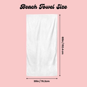 May include: A white beach towel with dimensions of 60 inches (152.4 cm) in length and 30 inches (76.2 cm) in width. The text "Beach Towel Size" is displayed at the top in a cursive font, set against a light pink background.
