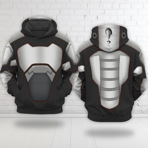 May include: Two black hoodies with a futuristic design. The front of the hoodies feature a silver and gray chest plate design with black accents. The back of the hoodies have a silver and gray design with a question mark on the hood.