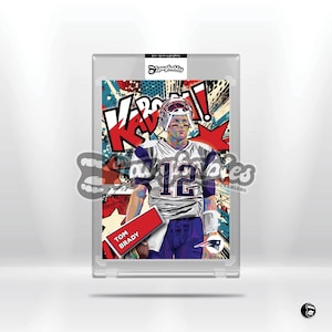 May include: A colorful pop art style illustration of Tom Brady in a football uniform with the word "KABOOM!" in the background. The image is framed in a clear plastic case.