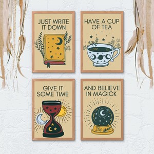 May include: Four framed prints with a yellow background and black outlines. The prints feature illustrations of a book, a teacup, an hourglass, and a snow globe. Each print has a quote related to magic and self-care. The quotes are "Just write it down", "Have a cup of tea", "Give it some time", and "And believe in magick".