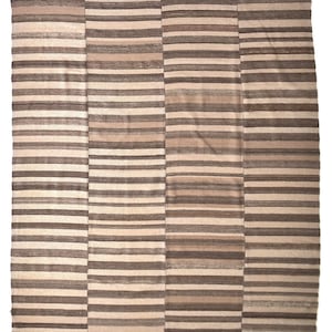 May include: A striped rug with a beige and brown colour scheme. The rug is made of woven fabric and has a rectangular shape.