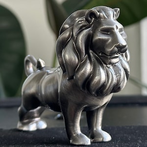 Lead Cast Lion Figurine: Retro Wildlife Decor