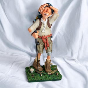 Hand-Painted Resin Hiker Figurine: Outdoor Adventure Decor