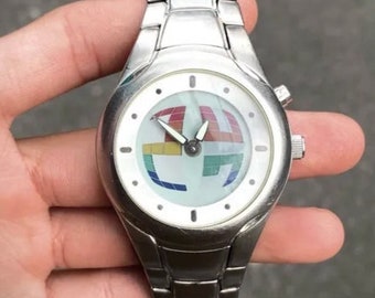 Fossil bigtic フォッシル レインボー y2k fossil BIG TICレインボー 数量限定復刻モデル y2k - メルカリ