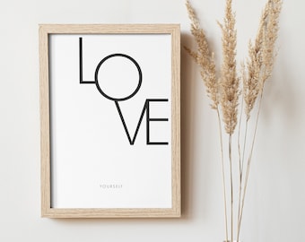 Könnte beinhalten: Ein gerahmter Druck mit einem minimalistischen Design, das das Wort "LOVE" in Schwarz mit einem Kreis für das "O" zeigt. Der Text "YOURSELF" ist unter dem Wort "LOVE" gedruckt. Der Druck ist in einem hellen Holzrahmen gerahmt und an einer weißen Wand ausgestellt.
