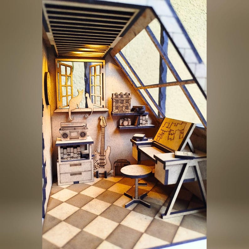 May include: A miniature wooden model of a room with a desk, chair, guitar, and cat. The room has a checkered floor and a window with a view of trees. The model is made of laser-cut wood and is a great example of miniature craftsmanship.