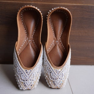 White Bridal Bliss: Handmade Beaded Party Shoes - Women&#39;s Khussa, Mojari, Indian Ethnic Gold Jutti, Elegant Footwear for Special Occasions..