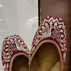 Handmade Dulhan Wedding Shoes - Maroon Cross-Strap Jutti with Ethnic Bead and Gold Work, Bridal Footwear for a Stylish and Traditional Look.