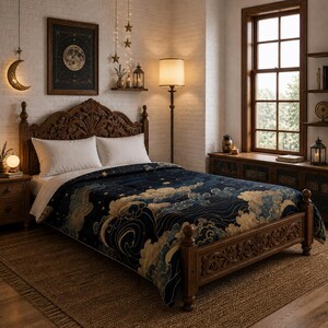 May include: A dark blue bedspread with a celestial design featuring clouds, stars, and waves. The bedspread is on a wooden bed frame with carved details. The room has a warm, inviting atmosphere with a moon-themed artwork and decorative lighting.