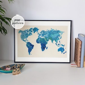 Modèle de carte du monde au point de croix en bleu aquarelle. Modèle d'ornement de broderie moderne au format PDF. Idée cadeau DIY déco personnalisée