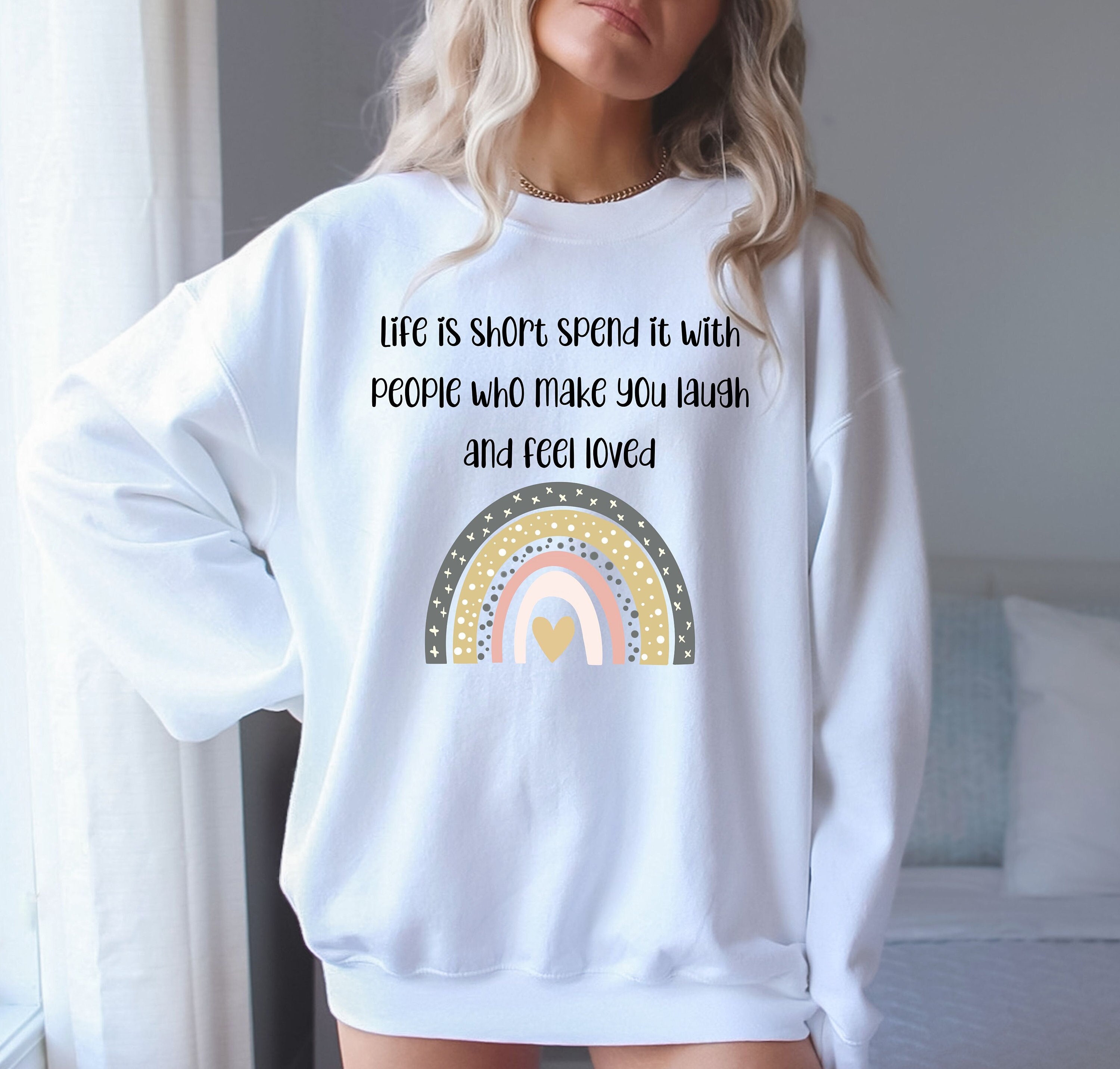 Life is short, spend it with people who make you laugh and feel loved -Unisex Heavy Blend Crewneck Sweatshirt