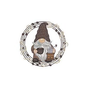 May include: A whimsical gnome illustration with a long white beard and a brown hat, holding a coffee cup and standing next to a coffee grinder. The gnome is surrounded by a circular wreath with brown and gold accents, all set against a white background.