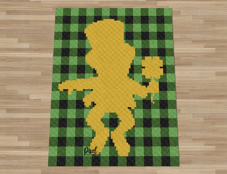 May include: A pixel art pattern of a leprechaun holding a four-leaf clover, on a green and black checkered background.