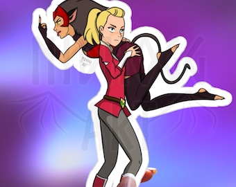 May include: A sticker featuring two cartoon characters, one with red hair and a cat tail, holding the other, who has blonde hair, in a playful pose. The sticker is on a white background.