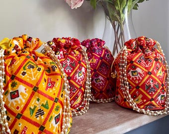 Patola Indian Shagan matrimonio potli regalo di nozze bomboniera borse Mithai