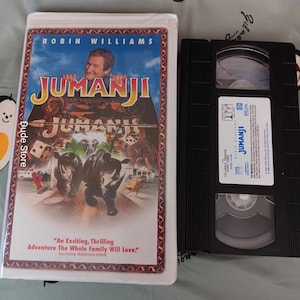 JUMANJI - Robin Williams - Rated PG - clam shell case - 1996 VHS