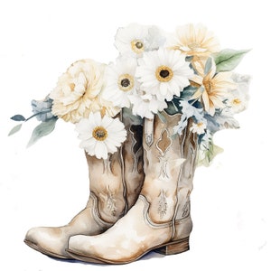 Puede incluir: Un par de botas vaqueras blancas con costuras intrincadas, llenas de un ramo de flores blancas y amarillas. Las flores est&aacute;n dispuestas en un estilo natural y r&uacute;stico.