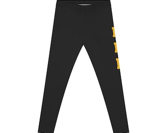 Leggings con letras verticales en negrita / Leggings negros con texto amarillo en el lateral
