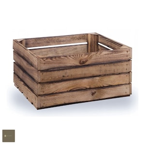 May include: A rustic wooden crate with a distressed brown finish. The crate is rectangular in shape and made of thick wooden planks. It has a simple design with no embellishments.