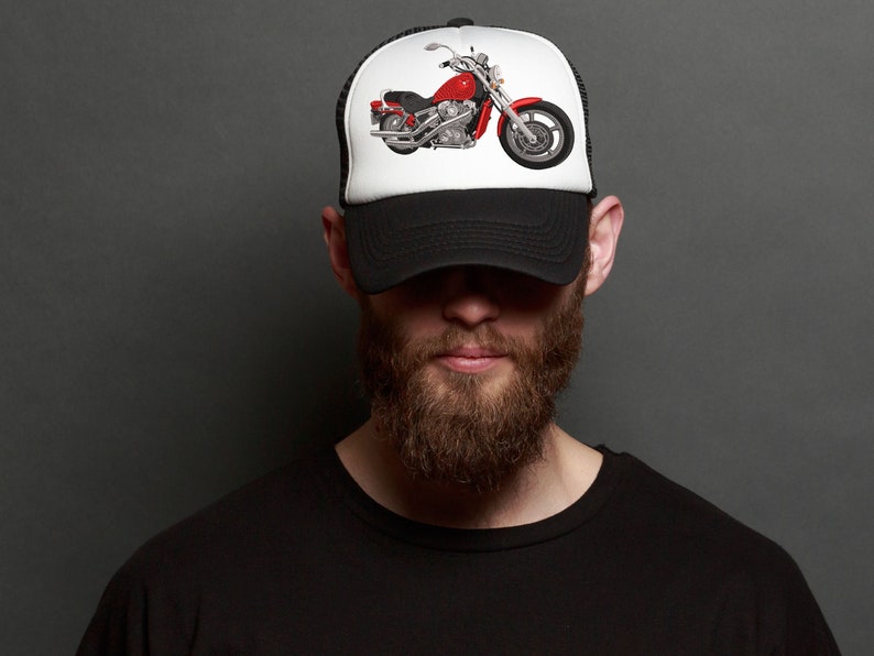 May include: A black trucker hat with a white mesh back. The front of the hat features a red and silver motorcycle graphic.