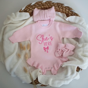 She’s here embroidered Romper, knit ribbed ruffle romper custom, gender reveal announcement, it’s a girl