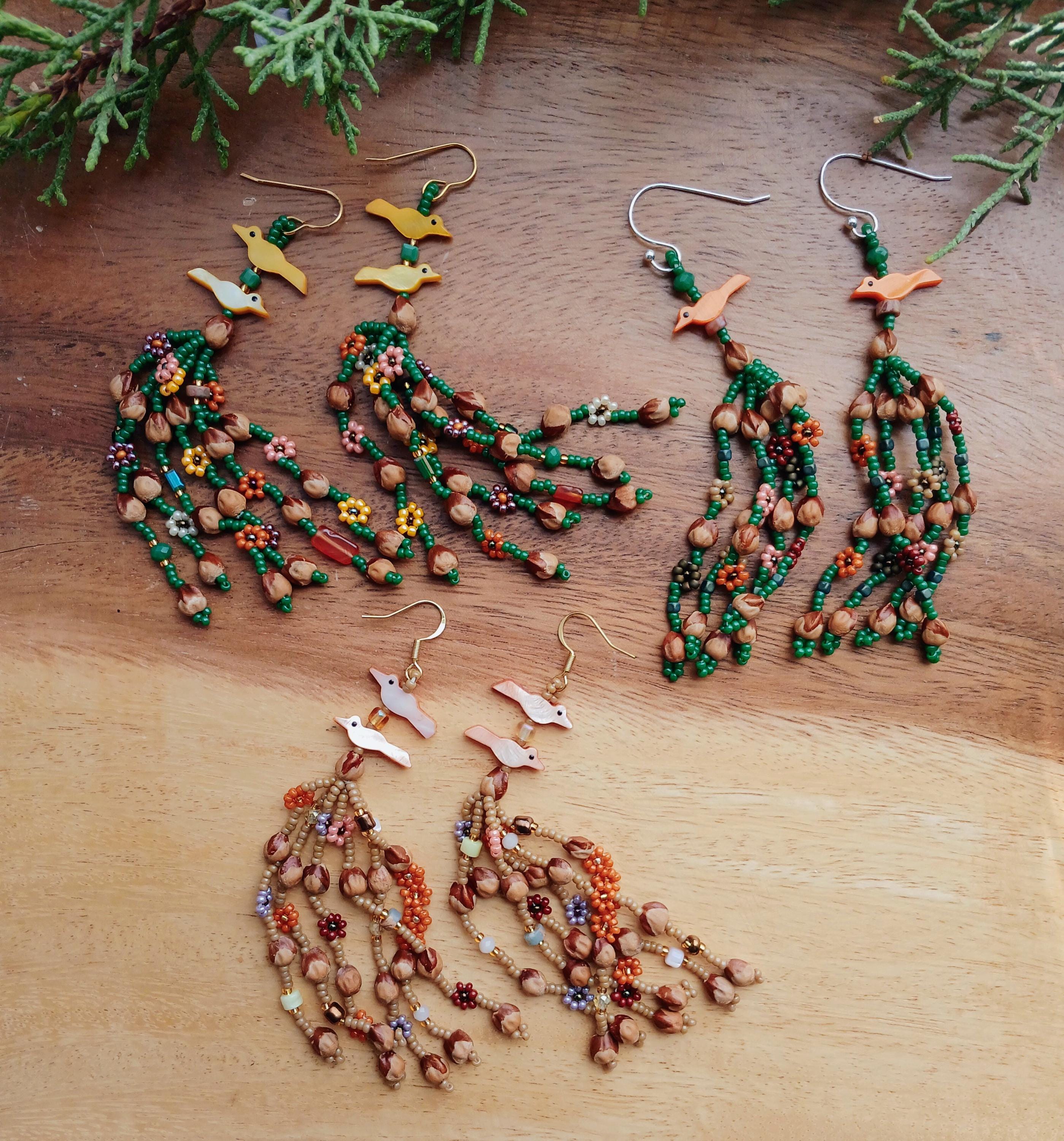 Juniper berry seeds, glass beads, and mother of pearl birds. Navajo handmade.