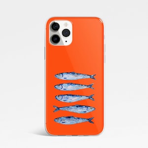 May include: A clear phone case with a bright orange background and a row of five blue and silver fish printed on the back.