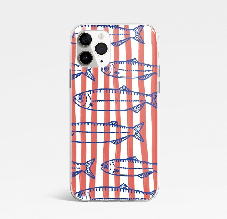 May include: A clear phone case with a red and white striped pattern and blue illustrations of fish. The case is designed for an iPhone.
