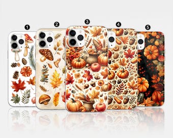 May include: Five different iPhone cases with autumn-themed designs. Each case features a variety of fall colors, including orange, brown, yellow, and red. The designs include pumpkins, leaves, acorns, and mushrooms.