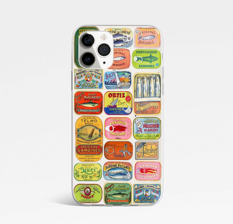 May include: A colorful phone case with a collage of vintage sardine can labels. The labels feature various designs and text, including "Sardines", "Original", "Portuguese Sardines", and "Telmo Brand".