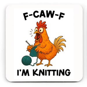 May include: Square white coaster with a cartoon chicken knitting. The chicken is orange with a red comb and is knitting with teal yarn. Text on the coaster reads "F-CAW-F I'M KNITTING".