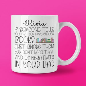 May include: White ceramic mug with the name "Olivia" in cursive. The mug has the text: "If someone tells you that you have enough books, just ignore them, you don't need that kind of negativity in your life."