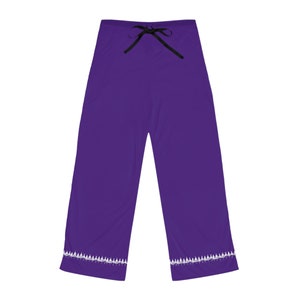 May include: Purple wide-leg pants with a black drawstring waist and white trim at the bottom.