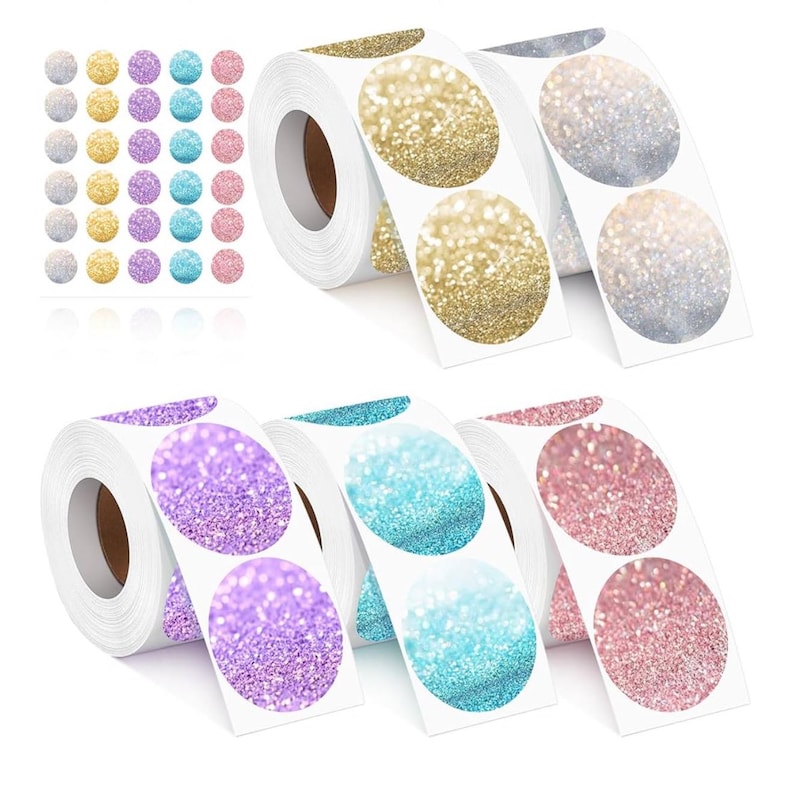May include: Four rolls of round stickers with glitter designs. Each roll has three different colours of glitter stickers: gold, silver, purple, pink, blue, and turquoise.