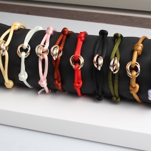 Pulsera Trinidad: delicada joyería de nudo celta para mujer. Un regalo espiritual para la amistad, el amor y la fuerza.