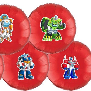 May include: Five red foil balloons with different Transformers characters printed on them. The characters are Optimus Prime, Bumblebee, Bulkhead, Arcee, and Wheeljack.