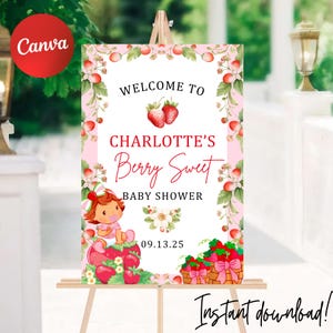 Op de afbeelding: Een roze en wit babyborrelbord met de tekst "Welcome to Charlotte's Berry Sweet Baby Shower". Het bord bevat aardbeienillustraties en een cartoonbaby. De datum 09.13.25 wordt ook weergegeven. Het bord staat op een ezel.