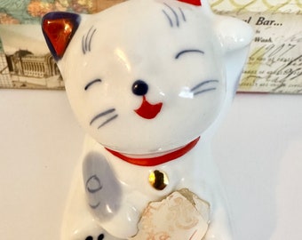 Japanese Figurine. Yakushigama Maniki Neko Cute Laughing Cat. Excellent Condition. Dimension: H8cm x W5cm. Absolutely lovable Puss and Boot!